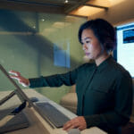 Woman looking at screen