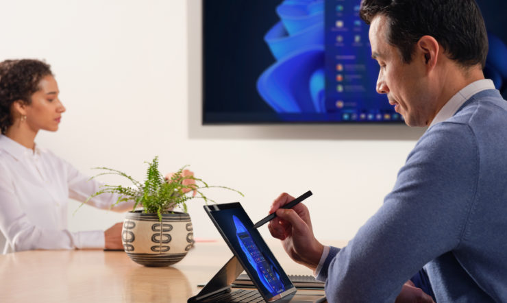 Two people working
