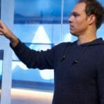 man working in security center