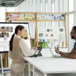 Woman and man talling in an office